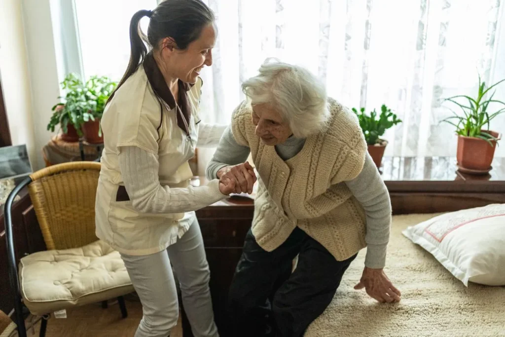 Caregiver sharing a warm moment with a resident
