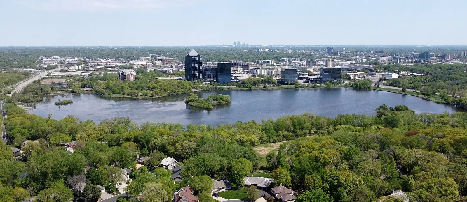 Aerial view of Normandale Lake and surrounding trees in Bloomington, Minnesota
